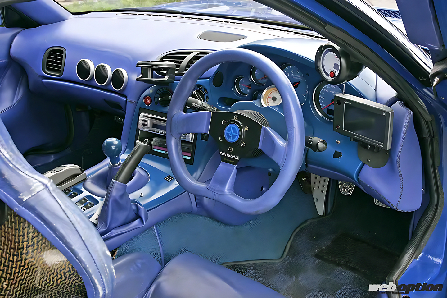 RE雨宮FD3S列伝の始まり」電動ガルウイング採用のGReddy.5が示した未来