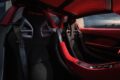 ファクトリー・リコミッションによって、レッド＆ホワイトのカラーリングが施された「ポルシェ カレラ GT」。