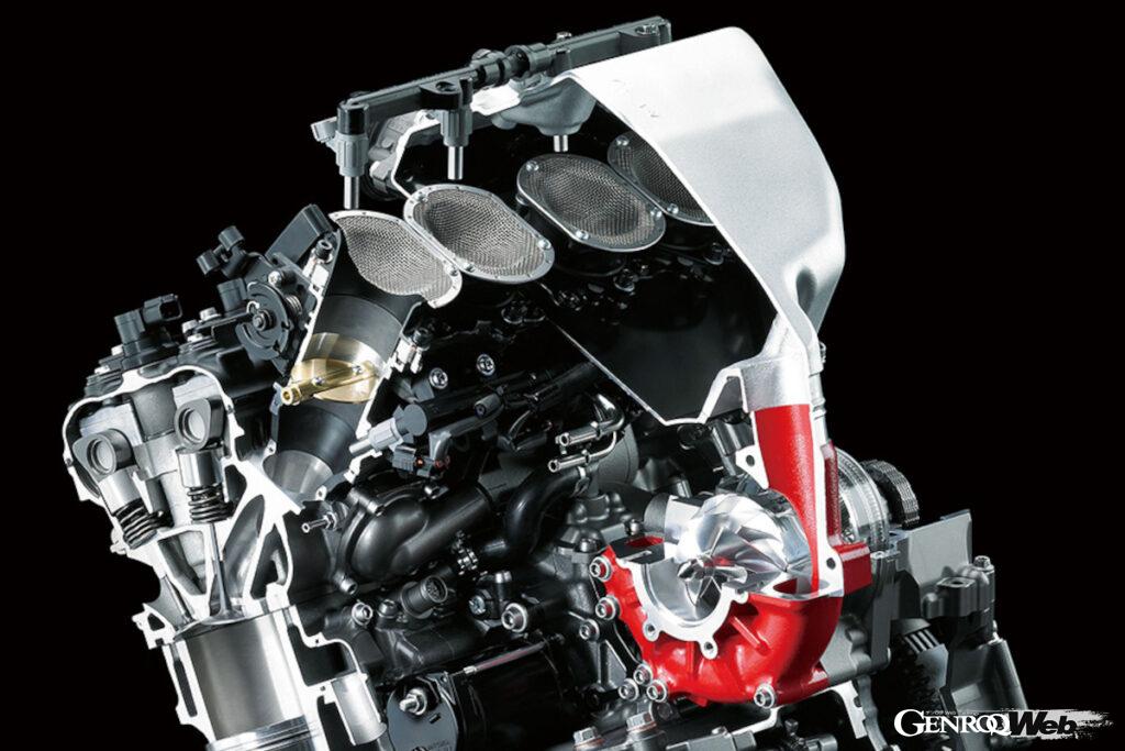 ニンジャH2Rに搭載される、水冷並列4気筒998ccエンジンのカットモデル。自社開発のスーパーチャージャー（赤い部分）をビルトインする専用設計エンジンで、2015年の発売時に公道仕様のH2が200PS、クローズドコース限定のH2Rでは310PSを発揮した。