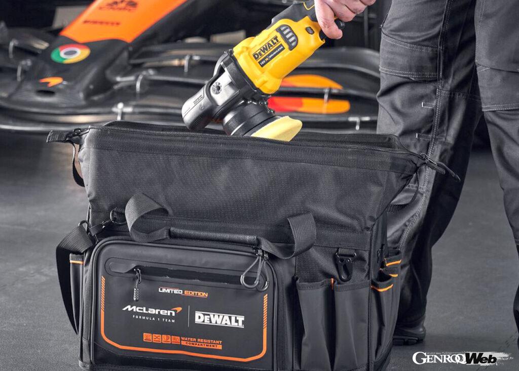 「DEWALT × McLaren F1チーム ⾓型バッグ」。33個のポケットやホルダーによる⾼い収納⼒を誇り、上部を完全に開くことでスペースが1.5倍に拡大する。