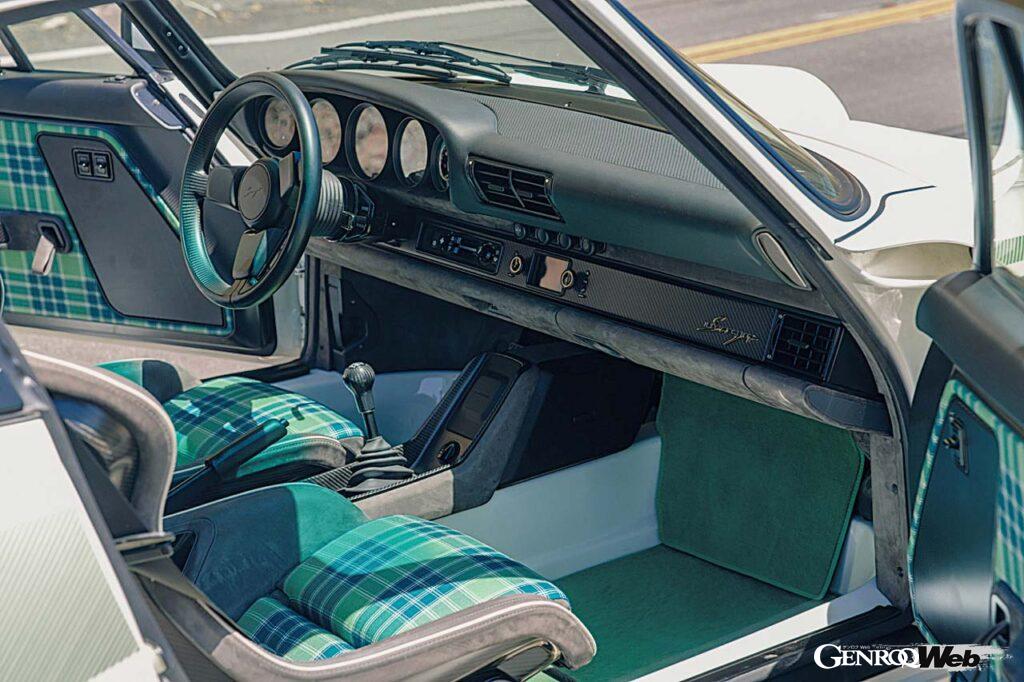 インテリアのコーディネートはオーナーの好み次第でほぼフルオーダーが可能。試乗車はダークグレーのヌバックにグリーンのタータンを組み合わせたバケットシートを装着。